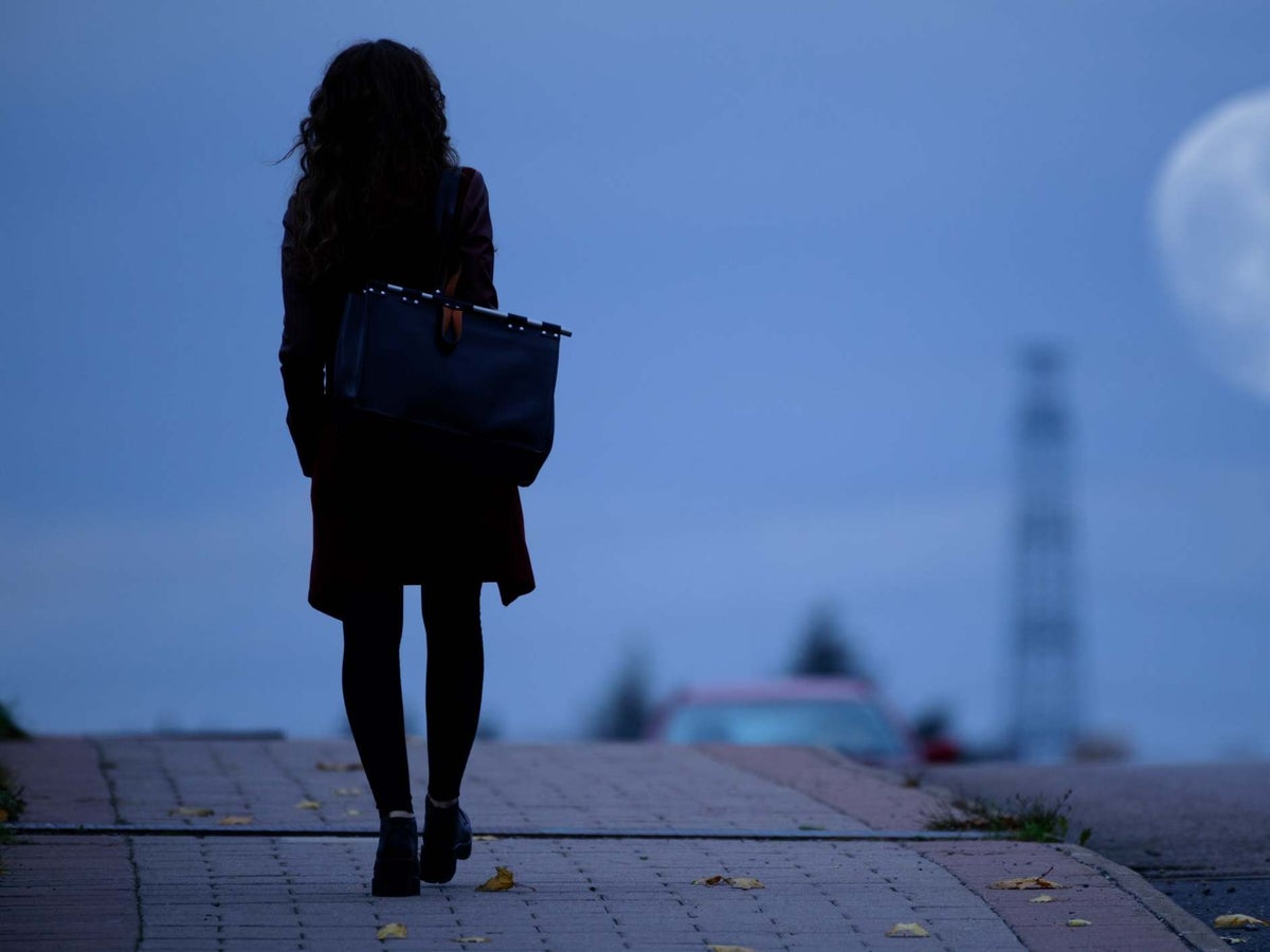 girl walking at night